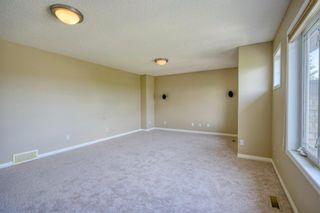 Photo 32: 170 Cougarstone Close SW in Calgary: Cougar Ridge Detached for sale : MLS®# A1222144
