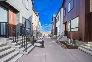 Photo 3: 318 Redstone Crescent NE in Calgary: Redstone Row/Townhouse for sale : MLS®# A1225580