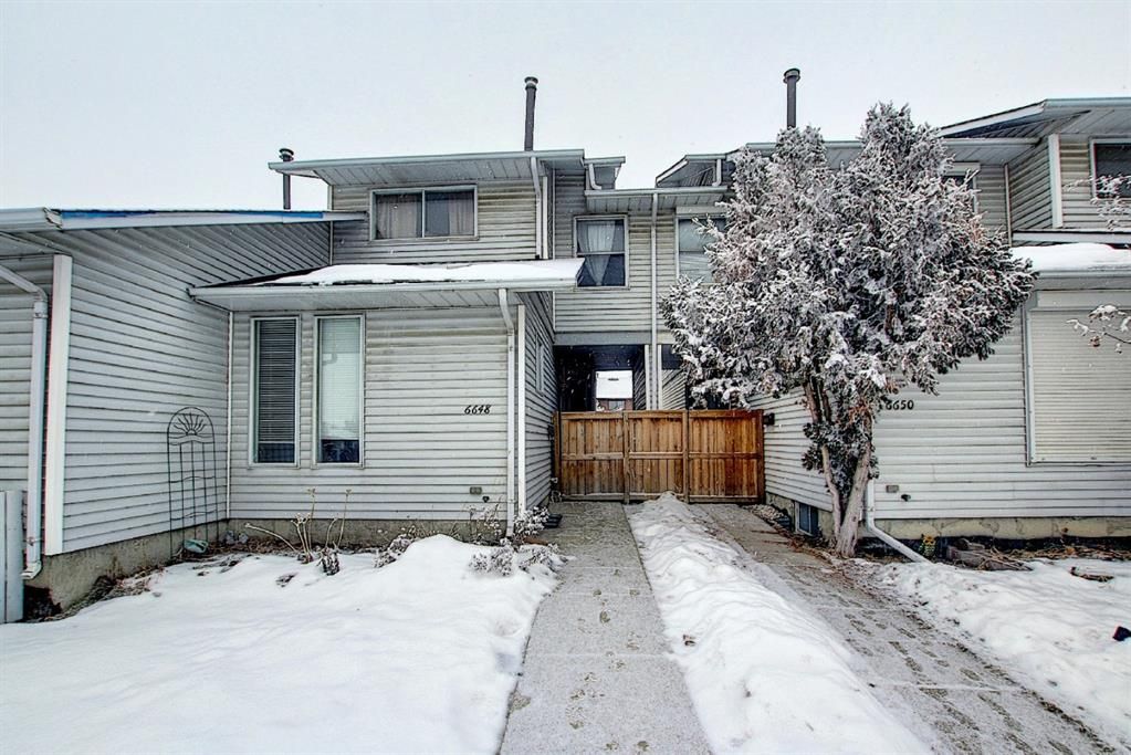 Main Photo: 6648 Temple Drive NE in Calgary: Temple Row/Townhouse for sale : MLS®# A1185976