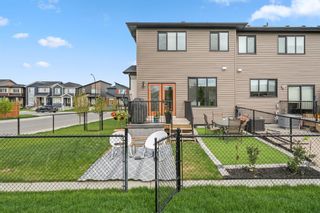 Photo 24: 41 Wolf Creek Manor SE in Calgary: C-281 Semi Detached for sale : MLS®# A1241778