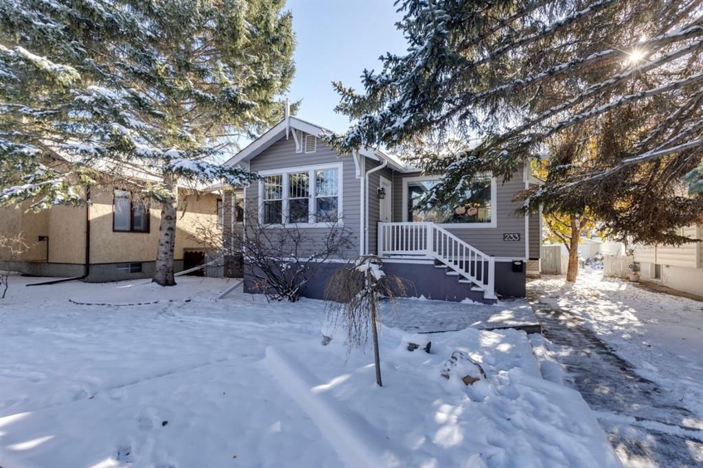 Main Photo: 233 10 Avenue NE in Calgary: Crescent Heights Detached for sale : MLS®# A2090341