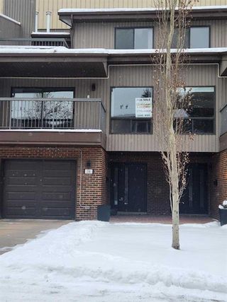 Main Photo: 34 Point Mckay Crescent NW in Calgary: Point McKay Row/Townhouse for sale : MLS®# A2112543