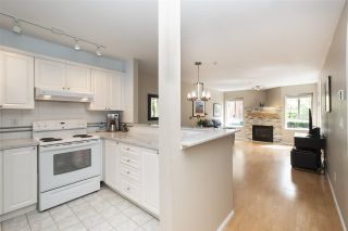 Photo 4: 102 128 W 8TH Street in North Vancouver: Central Lonsdale Condo for sale in "The Library" : MLS®# R2575197