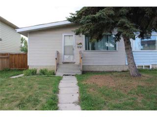 Photo 1: 3107 DOVER Crescent SE in CALGARY: Dover Residential Attached for sale (Calgary)  : MLS®# C3633701