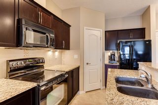 Photo 4: 407 1 Crystal Green Lane: Okotoks Apartment for sale : MLS®# A1156936