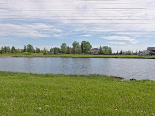 Photo 5: 167 LAKESIDE GREENS Court: Chestermere House for sale : MLS®# C4120469