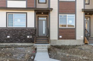 Photo 4: 167 Wolf Creek Avenue SE in Calgary: C-281 Row/Townhouse for sale : MLS®# A2006523
