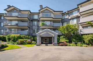 Photo 1: 211 5375 205 Street in Langley: Langley City Condo for sale in "Glenmont Park" : MLS®# R2724460