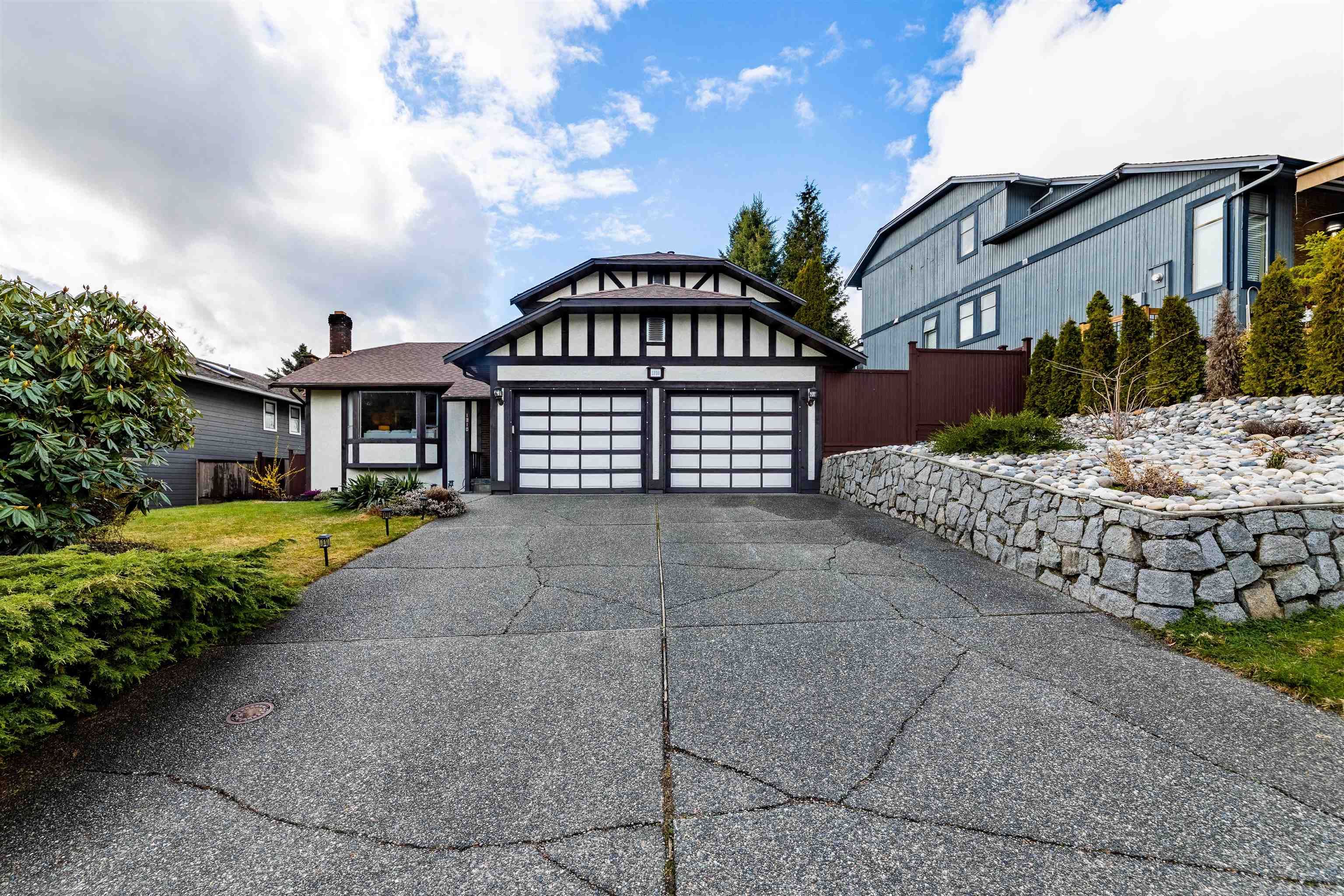 Main Photo: 1310 HONEYSUCKLE Lane in Coquitlam: Summitt View House for sale : MLS®# R2763388
