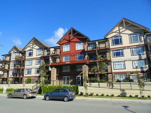 Main Photo: 406 19939 55A Avenue in Langley: Langley City Condo for sale in "Madison Crossing" : MLS®# R2069976