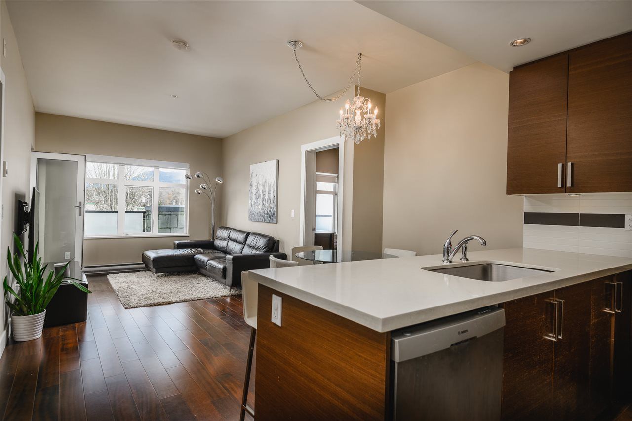 Main Photo: 201 4710 HASTINGS STREET in Burnaby: Capitol Hill BN Condo for sale (Burnaby North)  : MLS®# R2555974