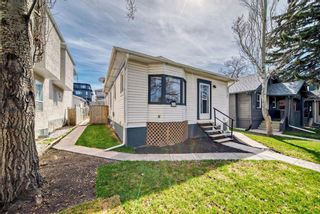 Photo 2: 115 25 Avenue NW in Calgary: Tuxedo Park Detached for sale : MLS®# A2137976