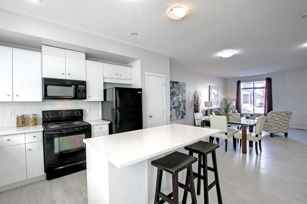 Photo 15: Photos: 39 300 Evanscreek Court NW in Calgary: Evanston Row/Townhouse for sale : MLS®# A1195350