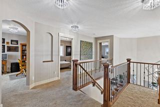 Photo 23: 100 Tremblant Way SW in Calgary: Springbank Hill Detached for sale : MLS®# A1230428