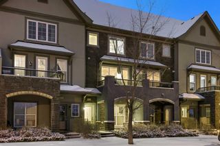 Main Photo: 424 QUARRY Way SE in Calgary: Douglasdale/Glen Row/Townhouse for sale : MLS®# A2117060