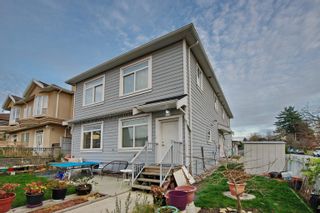 Photo 1: 213 E 64 Avenue in Vancouver: South Vancouver 1/2 Duplex for sale (Vancouver East)  : MLS®# R2635473
