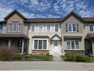 Photo 1: 86 Windstone Lane SW: Airdrie Row/Townhouse for sale : MLS®# A1226006