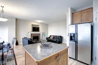 Photo 11: 242 Cougar Plateau Way SW in Calgary: Cougar Ridge Detached for sale : MLS®# A2007391