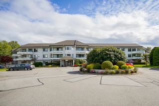 Photo 2: 216 2451 GLADWIN Road in Abbotsford: Abbotsford West Condo for sale in "Centennial Court - Maples" : MLS®# R2688829