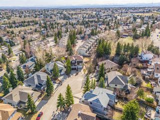 Photo 2: 25 Stradwick Place SW in Calgary: Strathcona Park Semi Detached (Half Duplex) for sale : MLS®# A2125910