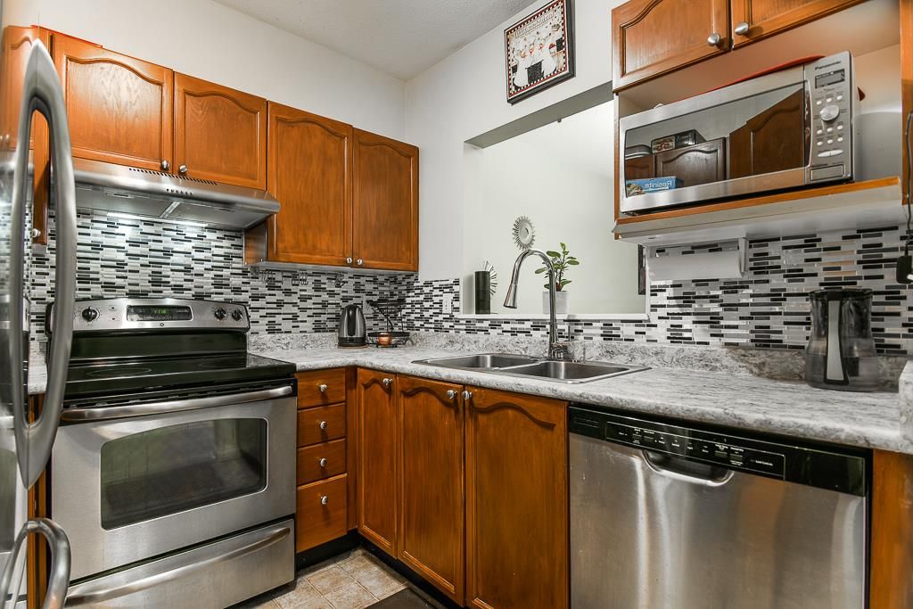 Main Photo: 102 6939 GILLEY Avenue in Burnaby: Highgate Condo for sale in "VENTURA PLACE" (Burnaby South)  : MLS®# R2418430