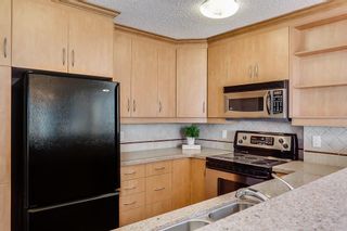 Photo 7: 2121 20 COACHWAY Road SW in Calgary: Coach Hill Apartment for sale : MLS®# C4209212