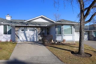 Photo 1: 16 Hawkside Park NW in Calgary: Hawkwood Row/Townhouse for sale : MLS®# A1160017