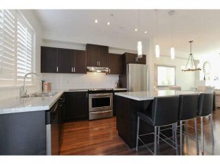Photo 5: 691 PREMIER Street in North Vancouver: Lynnmour Townhouse for sale in "WEDGEWOOD" : MLS®# V1106662