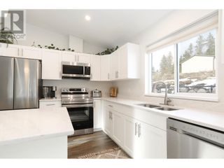 Photo 6: 7105 Dunwaters Road Fintry: Okanagan Shuswap Real Estate Listing: MLS®# 10308926