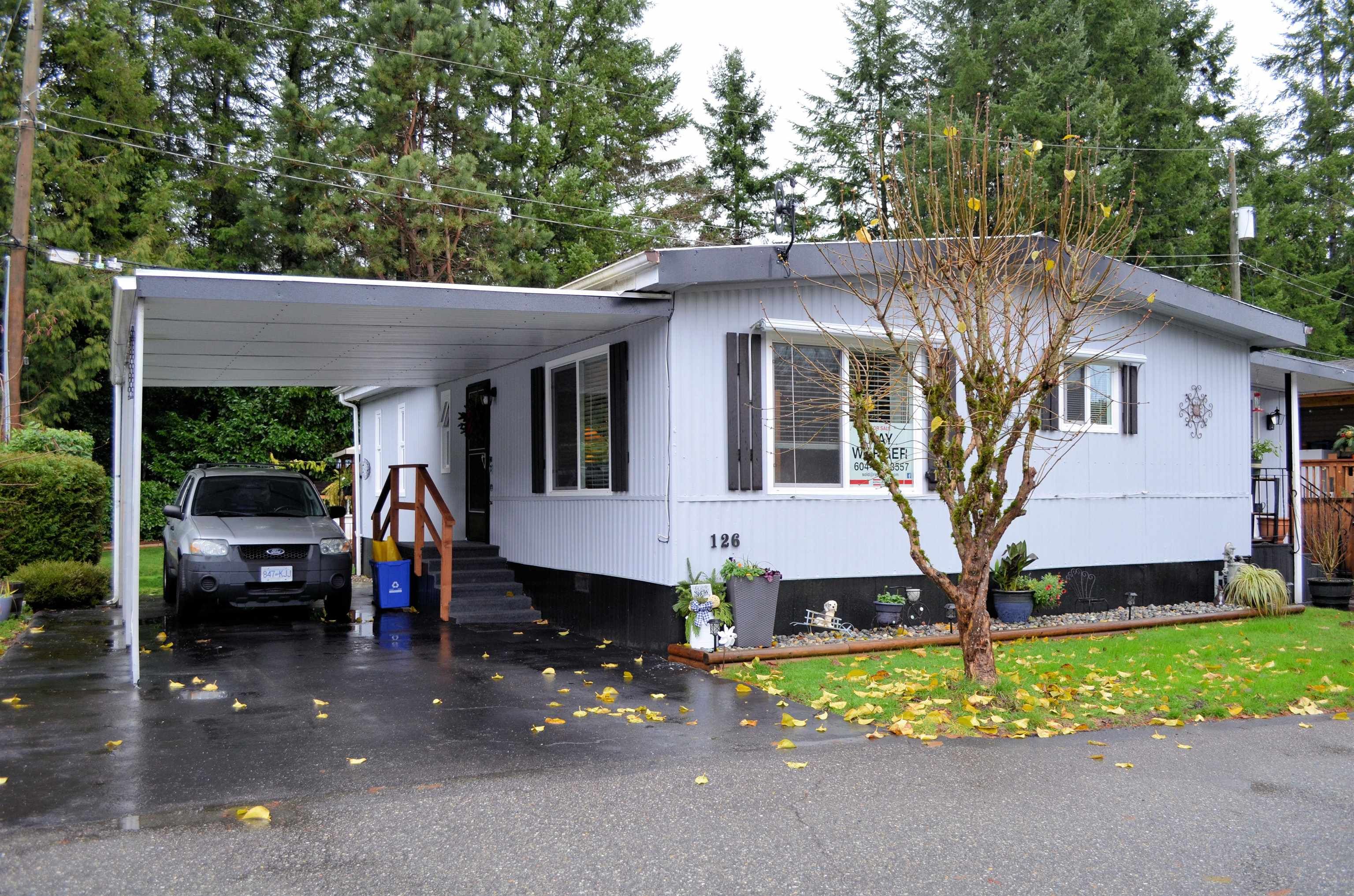 Main Photo: 126 3031 200 Street in Langley: Brookswood Langley Manufactured Home for sale in "Cedar Creek Estates" : MLS®# R2636085