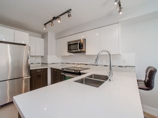 Photo 3: 401 2408 E BROADWAY in Vancouver: Renfrew VE Condo for sale in "BROADWAY CROSSING" (Vancouver East)  : MLS®# R2102626