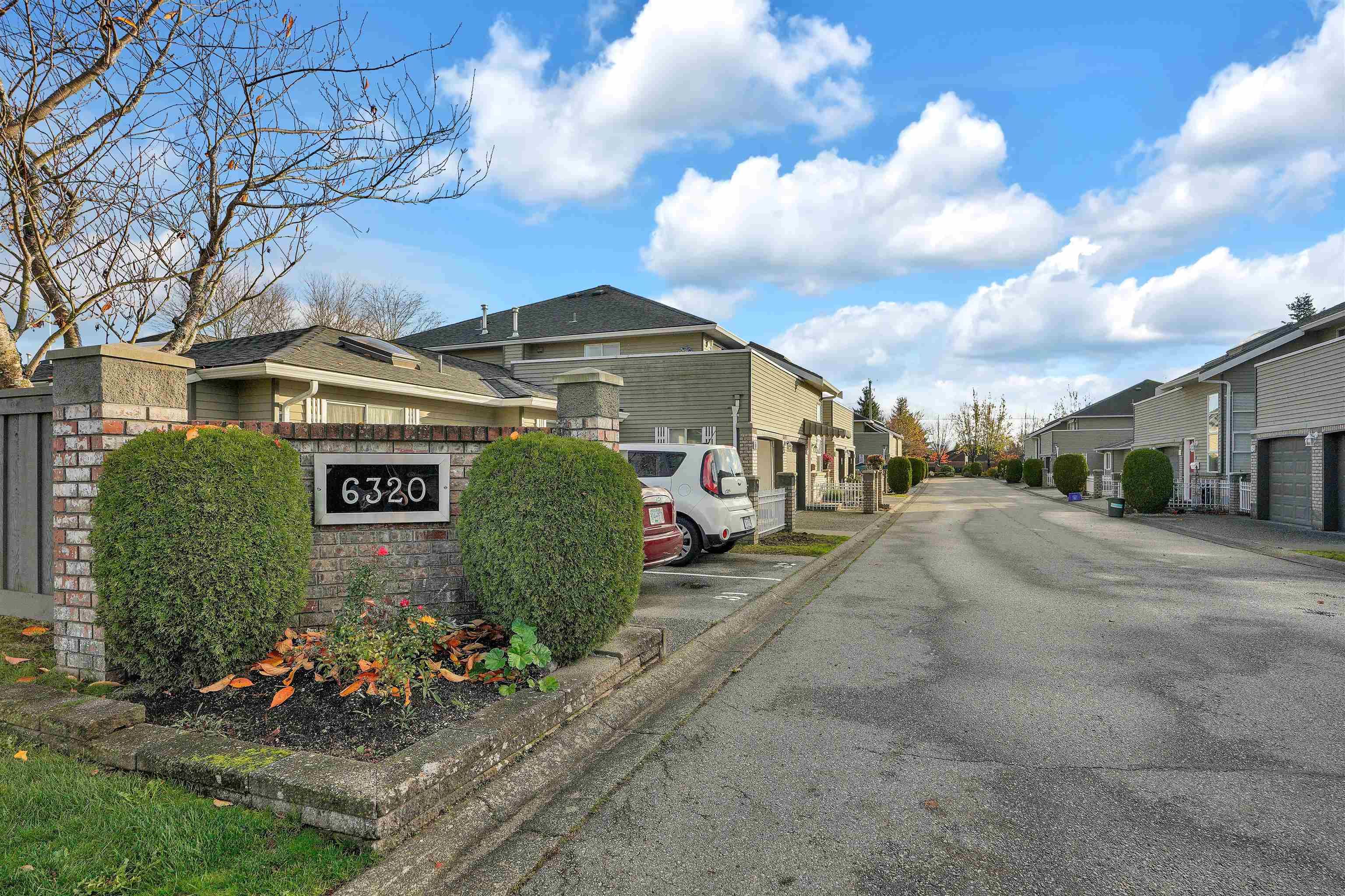 Main Photo: 7 6320 48A Avenue in Delta: Holly Townhouse for sale in "Garden Estates" (Ladner)  : MLS®# R2831957