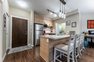 Photo 4: 118 1150 KENSAL Place in Coquitlam: New Horizons Condo for sale in "THOMAS HOUSE" : MLS®# R2711359