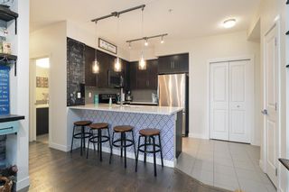 Photo 6: 211 25 Auburn Meadows Avenue SE in Calgary: Auburn Bay Apartment for sale : MLS®# A1214157