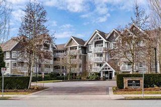 Photo 1: 403 20750 DUNCAN Way in Langley: Langley City Condo for sale in "Fairfield Lane" : MLS®# R2428188