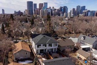 Photo 2: 224 8 Avenue NE in Calgary: Crescent Heights Semi Detached (Half Duplex) for sale : MLS®# A2124055
