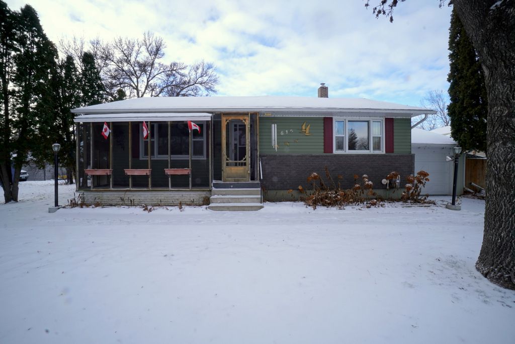 Main Photo: 615 Midland Street in Portage la Prairie: House for sale : MLS®# 202331954