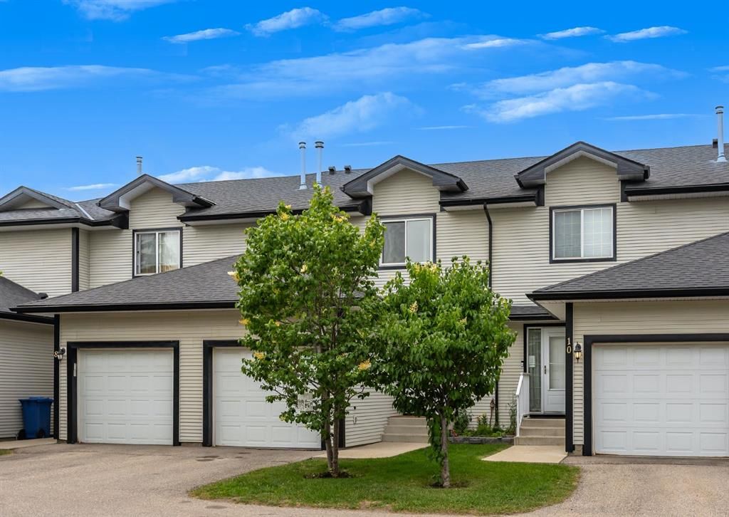 Main Photo: 9 12 Silver Creek Boulevard NW: Airdrie Row/Townhouse for sale : MLS®# A2063632