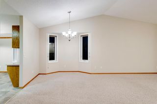 Photo 5: 165 Arbour Cliff Close NW in Calgary: Arbour Lake Semi Detached (Half Duplex) for sale : MLS®# A1237099