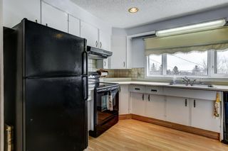 Photo 7: 7316 7 Street NW in Calgary: Huntington Hills Detached for sale