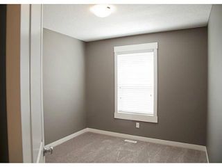 Photo 12: 452 Rainbow Falls Drive: Chestermere Townhouse for sale : MLS®# C3579282
