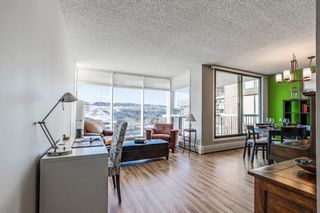 Photo 5: 1806 145 Point Drive NW in Calgary: Point McKay Apartment for sale : MLS®# A1064178