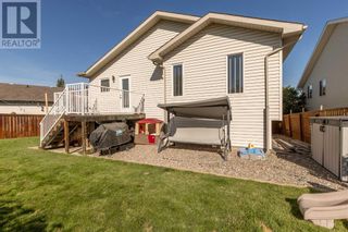 Photo 41: 110 Heritage Court W in Lethbridge: House for sale : MLS®# A2081300