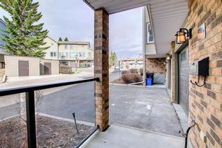 Photo 2: 14 Coachway Gardens SW in Calgary: Coach Hill Row/Townhouse for sale : MLS®# A1215253