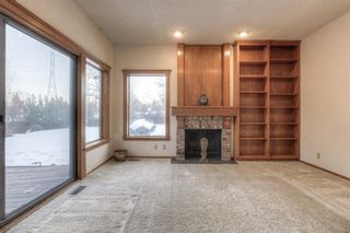 Photo 19: 7 Coach Gate Way SW in Calgary: Coach Hill Detached for sale : MLS®# A2045451