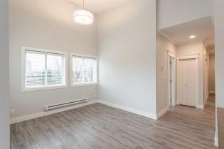 Photo 17: 504 2229 ATKINS Avenue in Port Coquitlam: Central Pt Coquitlam Condo for sale in "Downtown Pointe" : MLS®# R2553513
