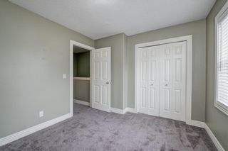 Photo 32: 312 BRIDLEWOOD Lane SW in Calgary: Bridlewood Row/Townhouse for sale : MLS®# A1046866