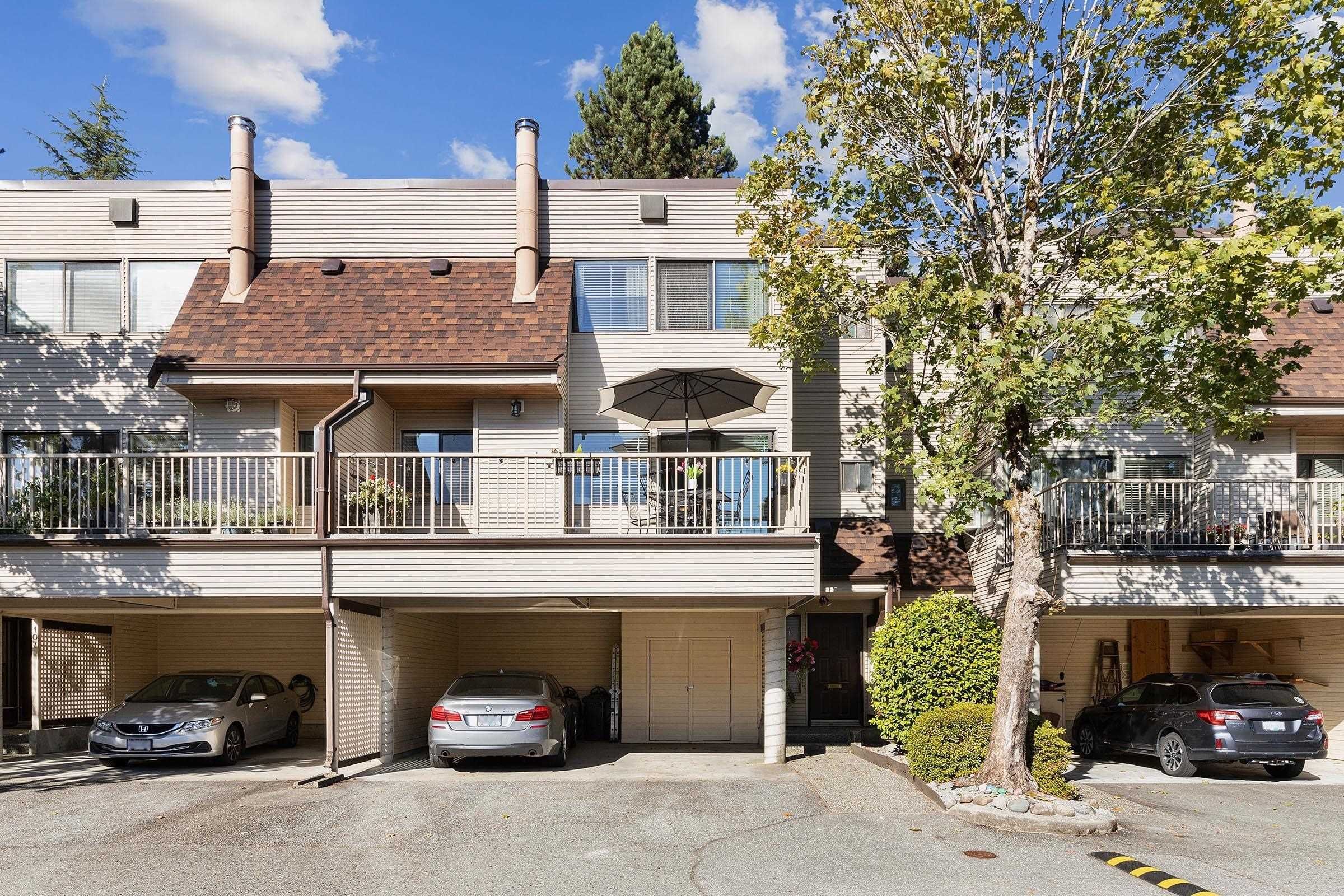 Main Photo: 105 1210 FALCON Drive in Coquitlam: Upper Eagle Ridge Townhouse for sale in "Fernleaf Place" : MLS®# R2725843