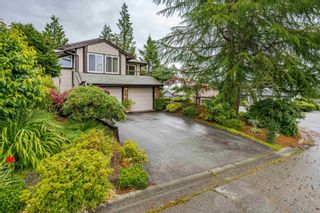Photo 1: 17 CAMPION Court in Port Moody: Mountain Meadows House for sale : MLS®# R2707325