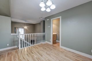 Photo 15: 312 BRIDLEWOOD Lane SW in Calgary: Bridlewood Row/Townhouse for sale : MLS®# A1046866